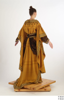  Photos Woman in Historical Dress 12 15th century Medieval Clothing a poses brown dress 0006.jpg